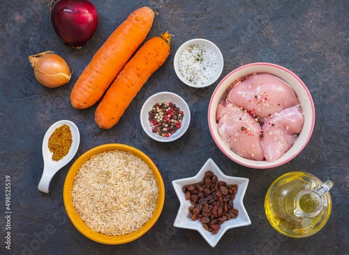Wallpaper Mural Prepared ingredients for cooking pilaf with chicken on a dark concrete background. Step by step recipes. Torontodigital.ca