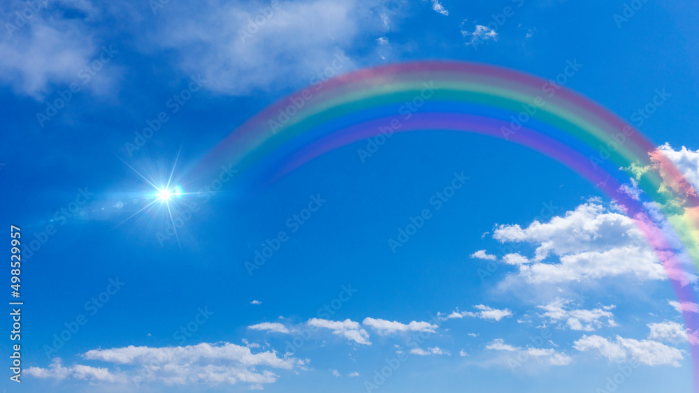 Panorama background of rainbow-covered blue sky and sun_49