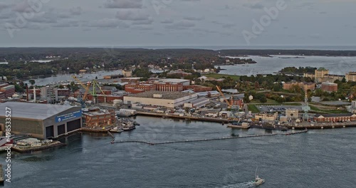 Portsmouth New Hampshire Aerial v9 panoramic view capturing navel shipyard at kittery maine across piscataqua river with downtown cityscape at sunset - Shot with Inspire 2, X7 camera - October 2021 photo