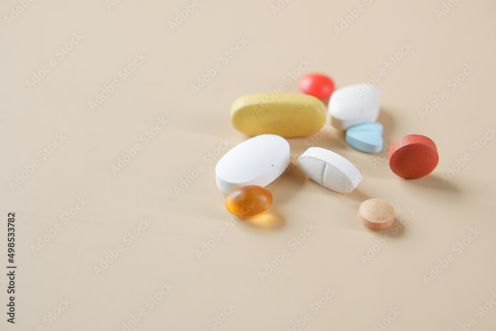 Close up of many colorful pills and capsules 