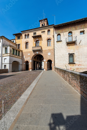 Small town of Oderzo in Treviso province, Veneto, Italy, Europe. Frescoed palaces and medieval tower called Torresin, town square called Piazza Grande.