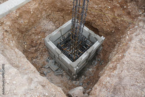 фотографія reinforcement steel for the construction foundation or footing in concrete formwork for the next stage of work
