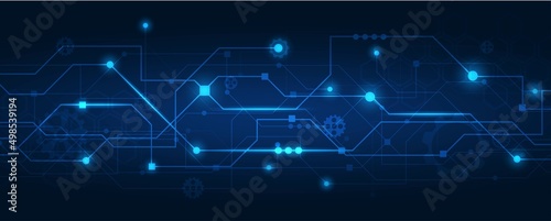 Technology background.Circuit board with the light dark blue.