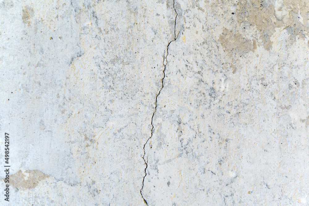 Fototapeta premium Crack on concrete wall texture, background, selective focus