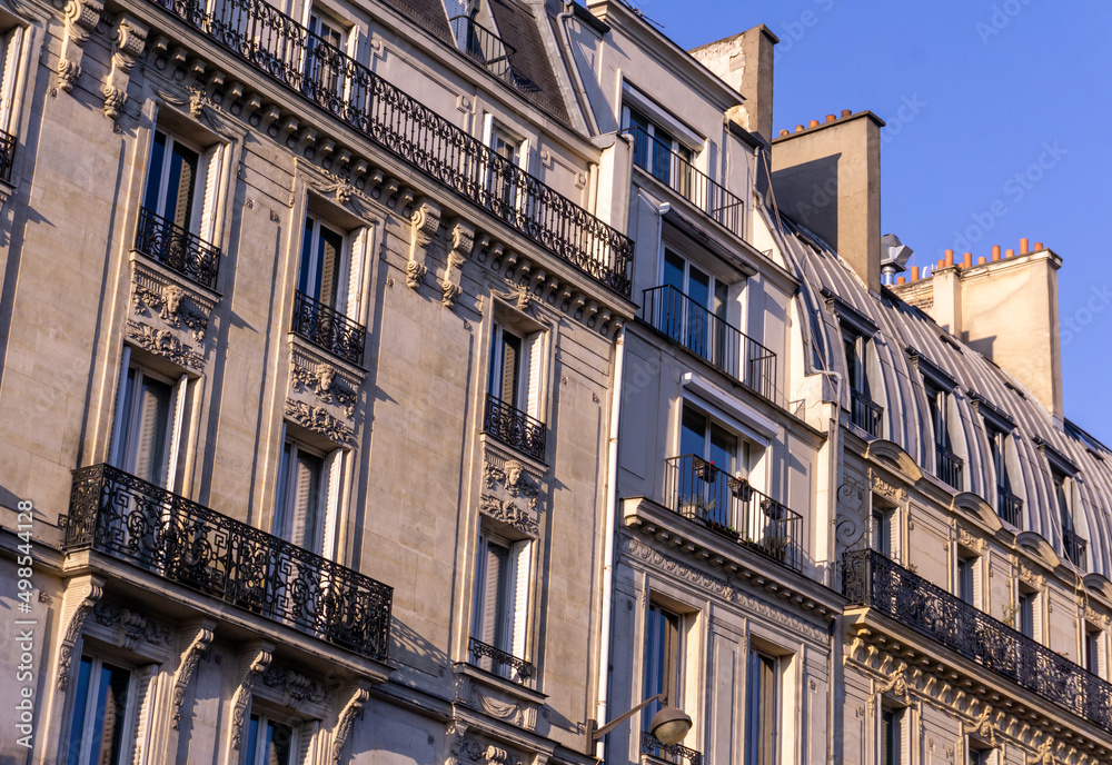 Traditional building facade on the street in the historical center of Paris