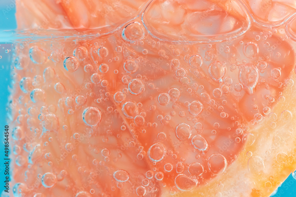 Macro photo of a citrus cocktail. Summer Vitamin cocktail of orange, lemon and grapefruit. Macro photo of a citrus cocktail. Summer Vitamin cocktail of orange, lemon and grapefruit.