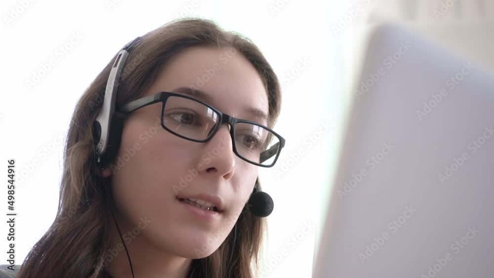 Close-up girl call center operator sells services. Call center. Close-up girl call center operator sells services. Call center.