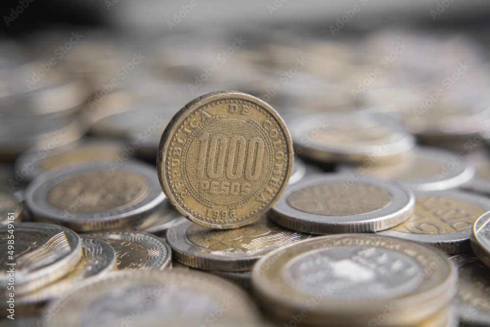 Stacks of Colombian coins of 500 and 1000 pesos denominations, money devaluation
Stacks of Colombian coins of 500 and 1000 pesos denominations, money devaluation
