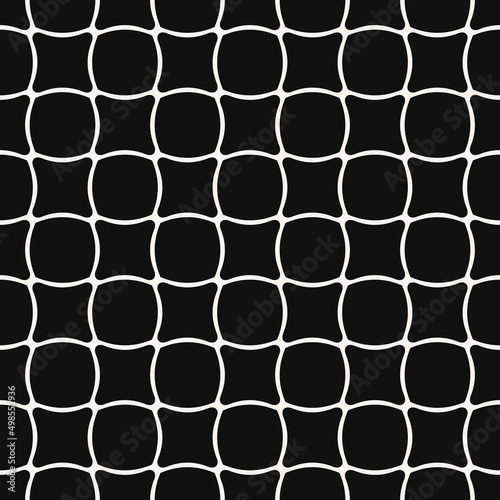 The tile is black in color with simple rounded shapes and retracted shapes. Vector with black identical tiles.