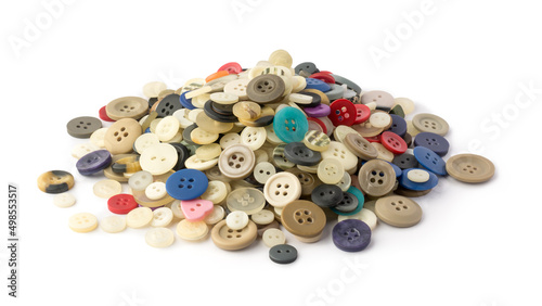 pile of various colors and design buttons on white background