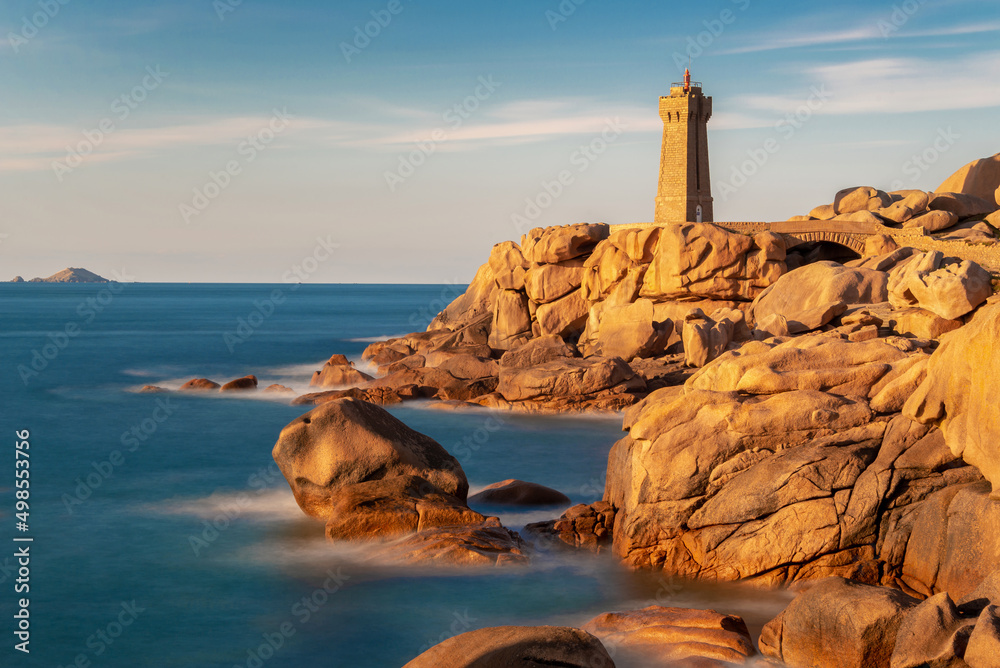 Lighthouse of Ploumanach at golden hour in Perros-Guirec, Côtes d'Armor, Brittany, France