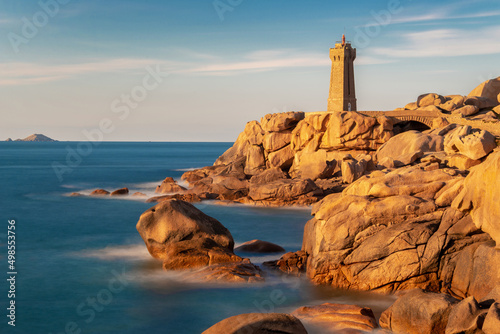 Lighthouse of Ploumanach at golden hour in Perros-Guirec, Côtes d'Armor, Brittany, France