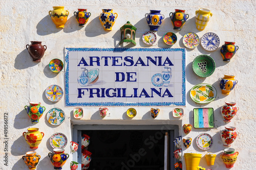 Colorful, ceramic pots and dishes exposed for sale in Frigiliana, Spain photo