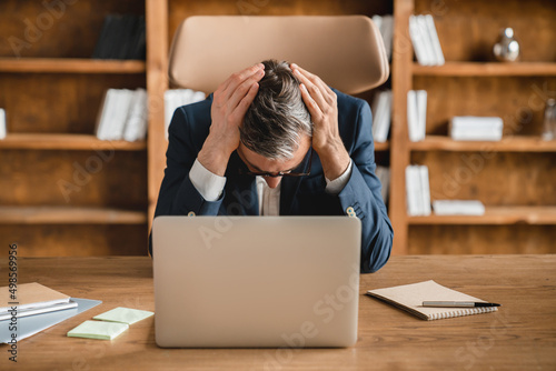 Canvastavla Tired exhausted depressed overworked businessman ceo boss freelancer having work