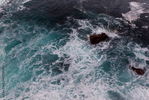 Rocks and Spanish sea on background 