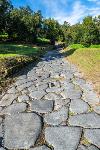 An ancient cobbled street in the Roman city of Cumae at Cumae ar photo