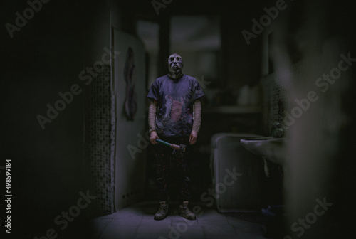 A murderer with an ax in the toilet - horror movie concept image - 3d illustration