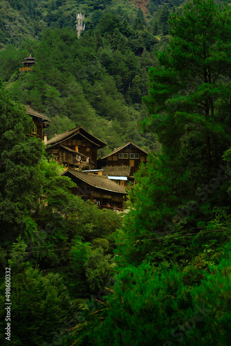 Beautiful shot of the old traditional houses in Langde Miao Ethnic Minority Village, Guizhou, China photo