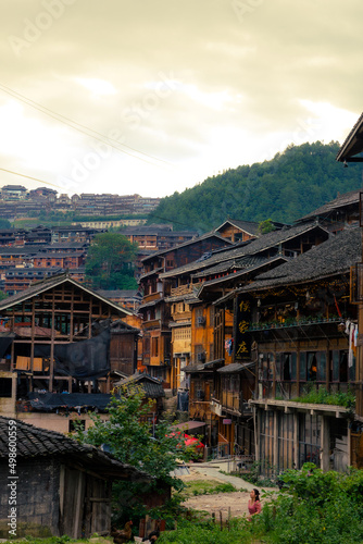 Beautiful shot of the old traditional houses in Langde Miao Ethnic Minority Village, Guizhou, China photo