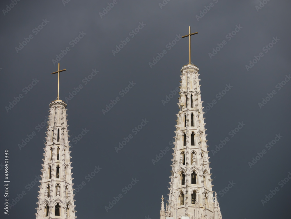 Close-up photo of a Zagreb Cathedral spires with a cloudy sky in the background, Zagreb, Croatia Close-up photo of a Zagreb Cathedral spires with a cloudy sky in the background, Zagreb, Croatia