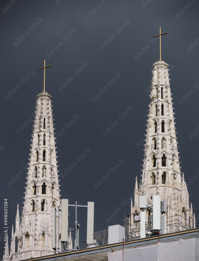Close-up photo of a Zagreb Cathedral spires with a cloudy sky in the background, Zagreb, Croatia Close-up photo of a Zagreb Cathedral spires with a cloudy sky in the background, Zagreb, Croatia