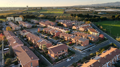 Aerial cityscape view from a droneof beautiful minimalist city architecture with small buildings photo