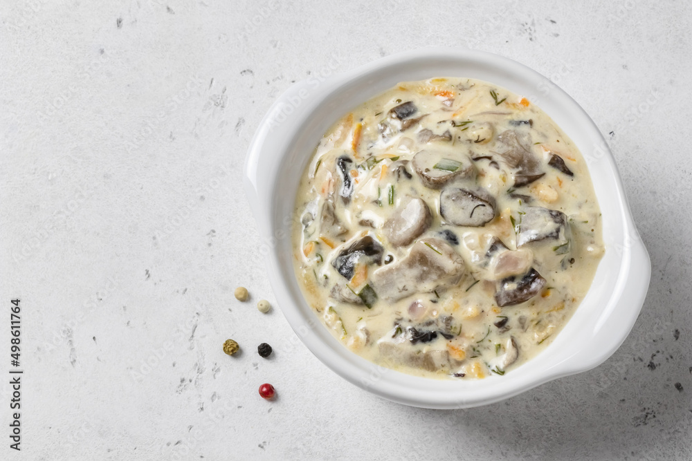 Creamy garlic carrot mushroom pasta sauce in pot. Top view, copy space. Creamy garlic carrot mushroom pasta sauce in pot. Top view, copy space.