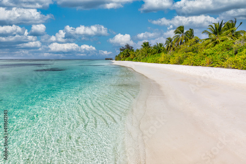 Fototapeta Naklejka Na Ścianę i Meble -  Amazing nature beach with palm trees, sea and sky. Summer vacation travel holiday background concept. Maldives paradise beach. Luxury travel summer holiday background concept. Paradise landscape