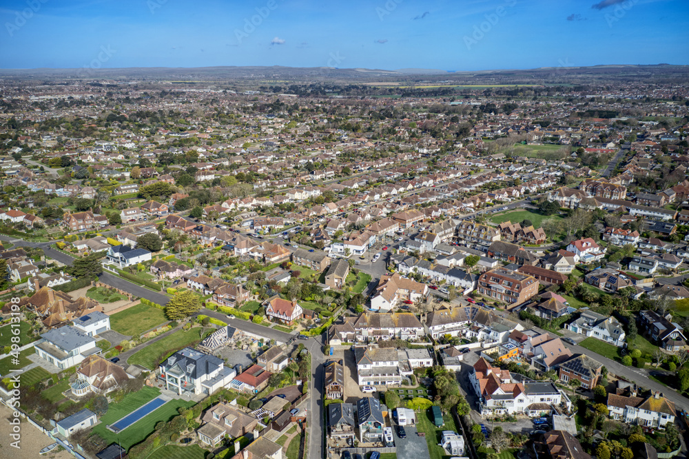 Aerial view of East Preston Village and Angmering on Sea with the south strand shops towards the centre of the photo. 