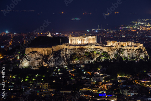 Illuminated Acropolis with Parthenon at night, Athens, Greece.