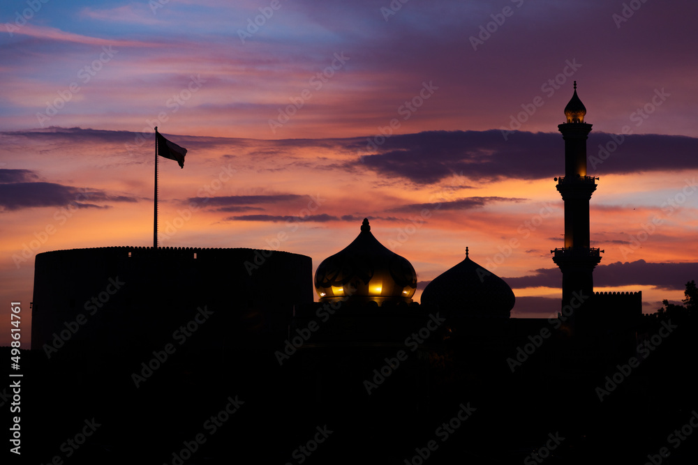 mosque and Nizwa fort in sunset