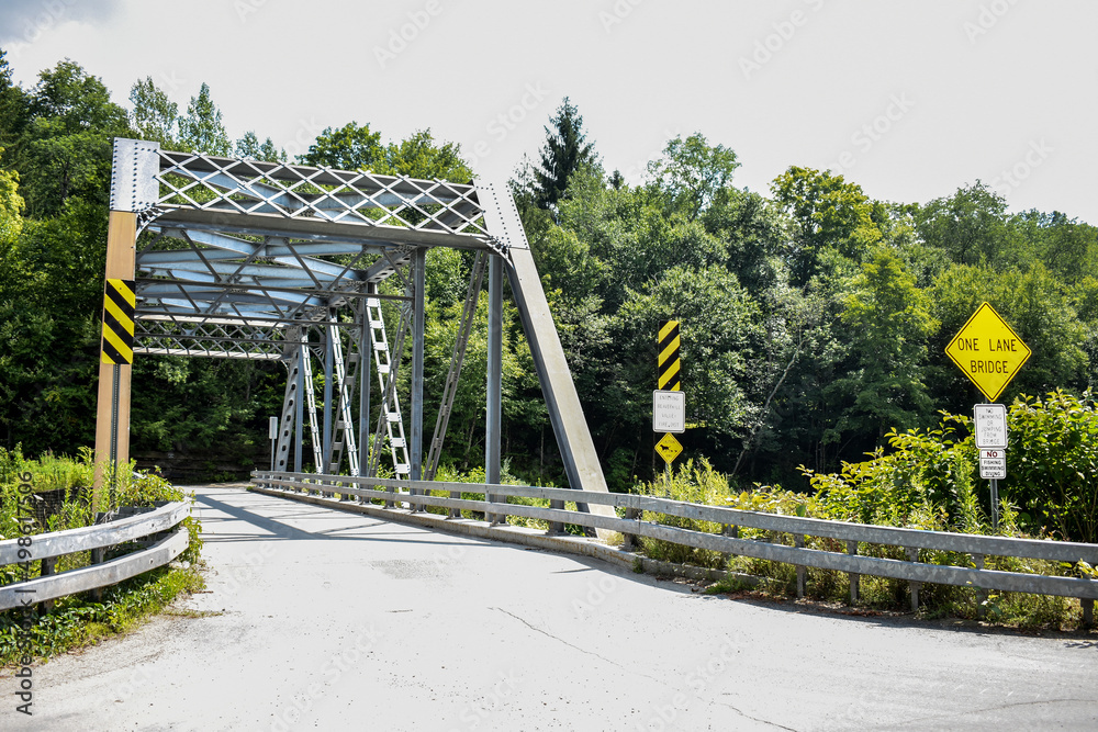 Old Metal Bridge Surrounded by Trees Old Metal Bridge Surrounded by Trees