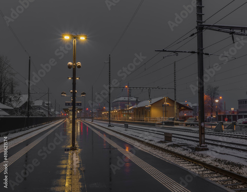 Very bad weather in Brunnen station in spring snowy morning © luzkovyvagon.cz
