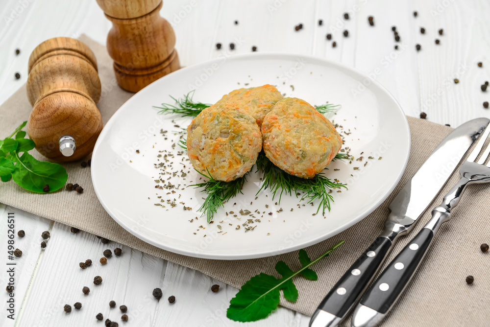 Steamed chicken cutlets with vegetables. Steamed chicken cutlets with vegetables.