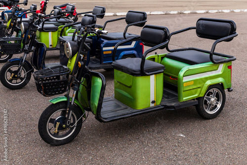 Olympic Park Sochi, Russia , Shayba Stadium, parking of electric cars. Electric scooters for rent for trips to the Olympic Park. Walking electric transport in the park photo