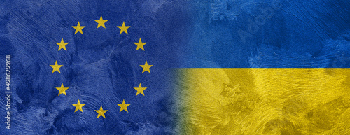 Textured photo of the flag of European Union and Ukraine.