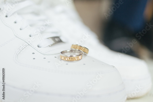 wedding rings on white sneaker
