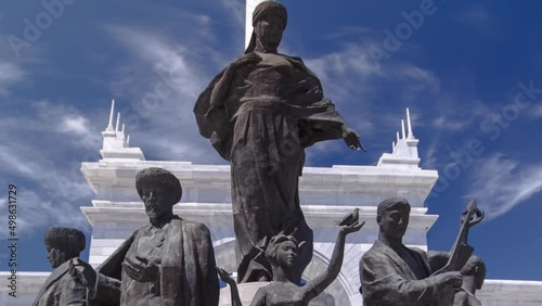 View of the Kazakh Eli Monument timelapse hyperlapse on Independence Square in Astana, the capital of Kazakhstan. photo
