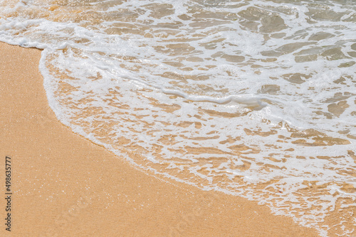 abstract background of waves on the beach sand