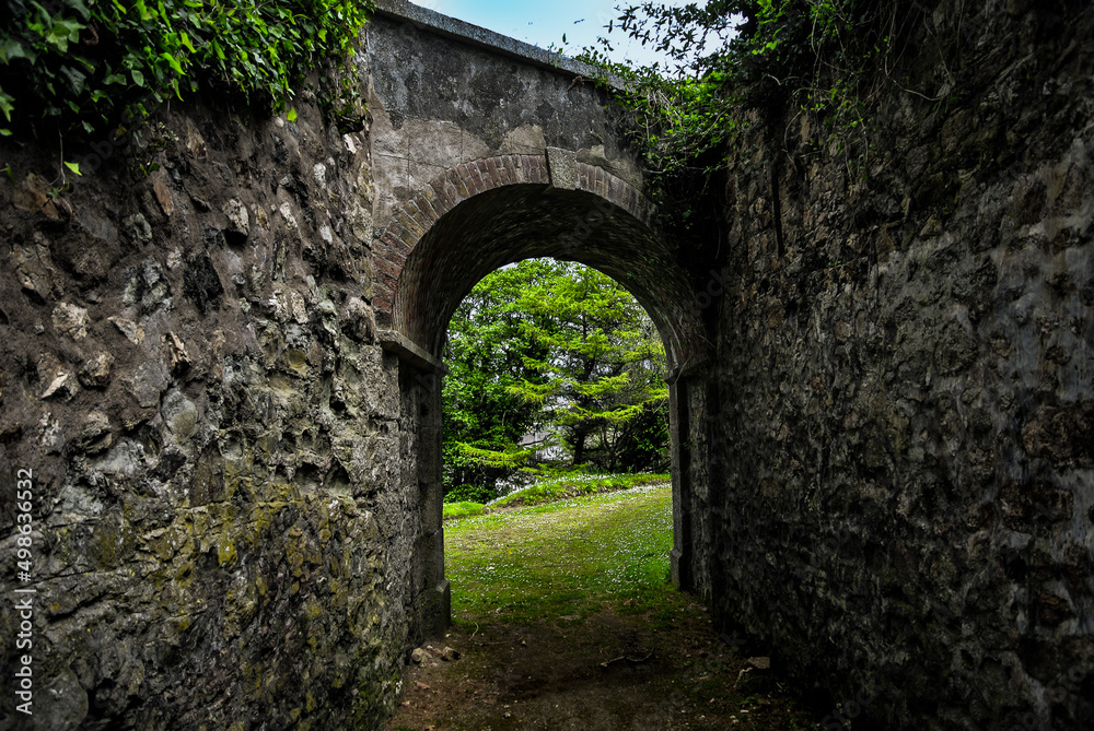 Stone archway leading to the park