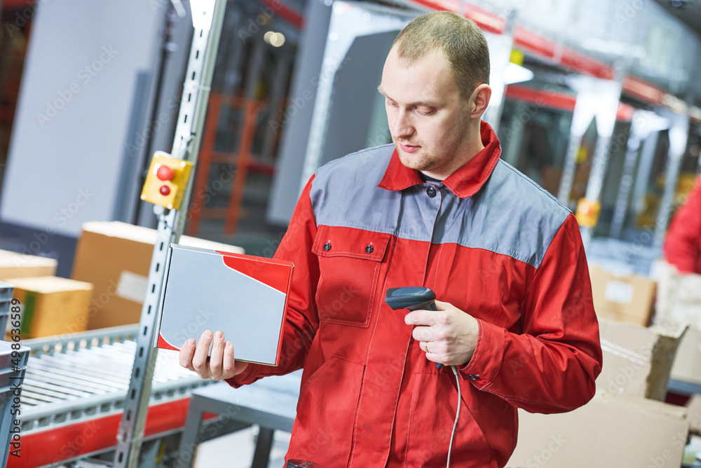 worker with laser barcode scanner at warehouse worker with laser barcode scanner at warehouse