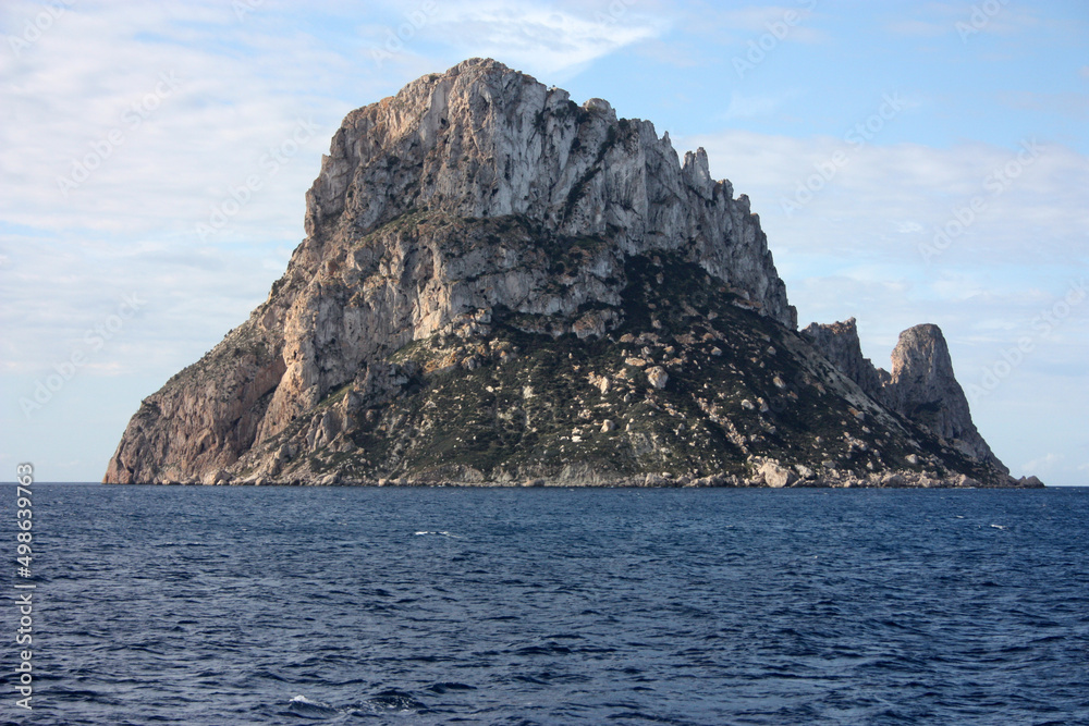 The small Balearic rocky islet of Es Vedra in the Ibiza Sea
