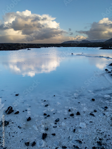 Blue colored, silica and mineral rich geothermal springs in a volcanic landscape (Iceland)