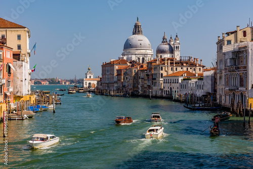 Boat traffic on the Grand Canal of Venice looking towards Salute from the Accademia area © whitcomberd