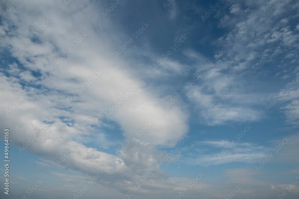 Obraz premium Blue cloudy sky. Nature background. Design backdrop