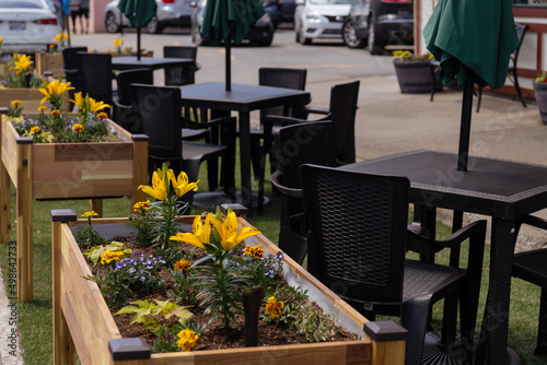 Canvas Print Outdoor Dining at a Restaurant in Leavenworth, WA with Flower Boxes