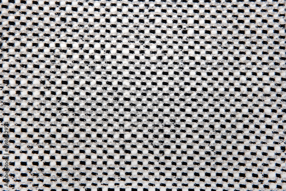 close up of the checked black and white upholstery fabric texture