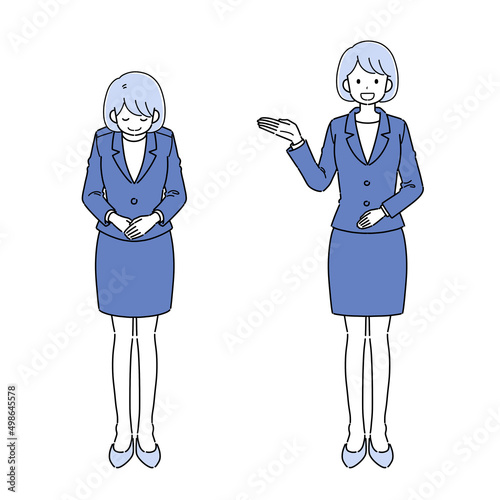 スーツを着た女性のお辞儀、案内ポーズ