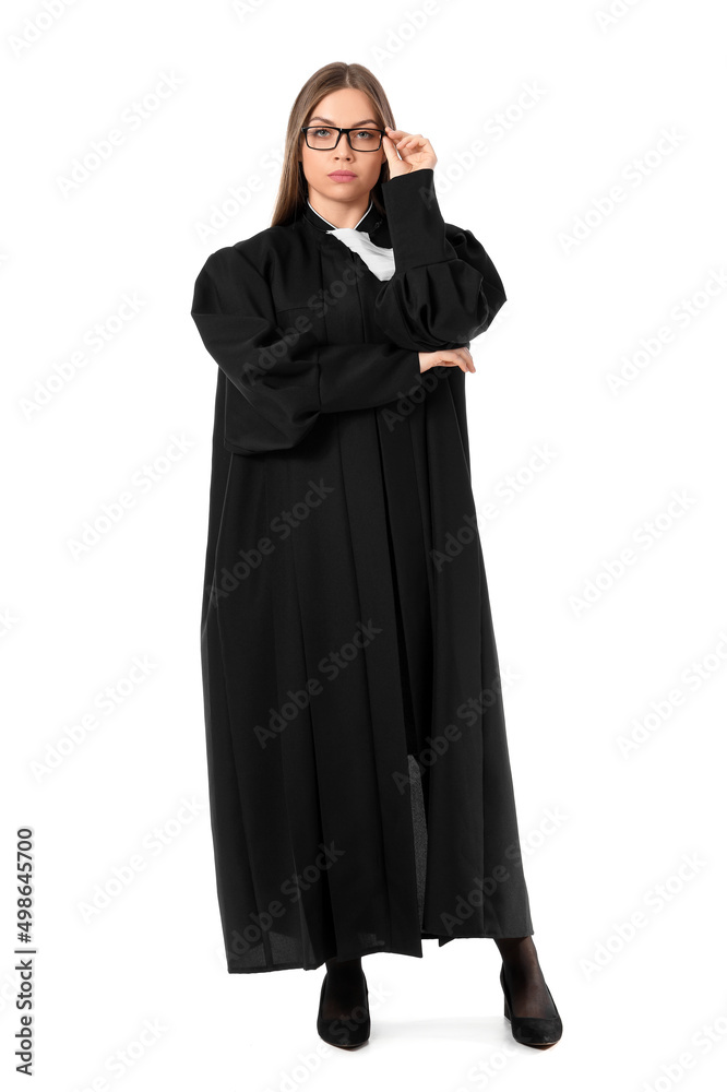 Young female judge on white background