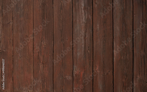 Natural Brown Wooden Background. Wooden rustic background. Old boards. Copy space for your text or image. Top view. Dark brown wood boards. Blank for design and require a wood grain. Vertical.